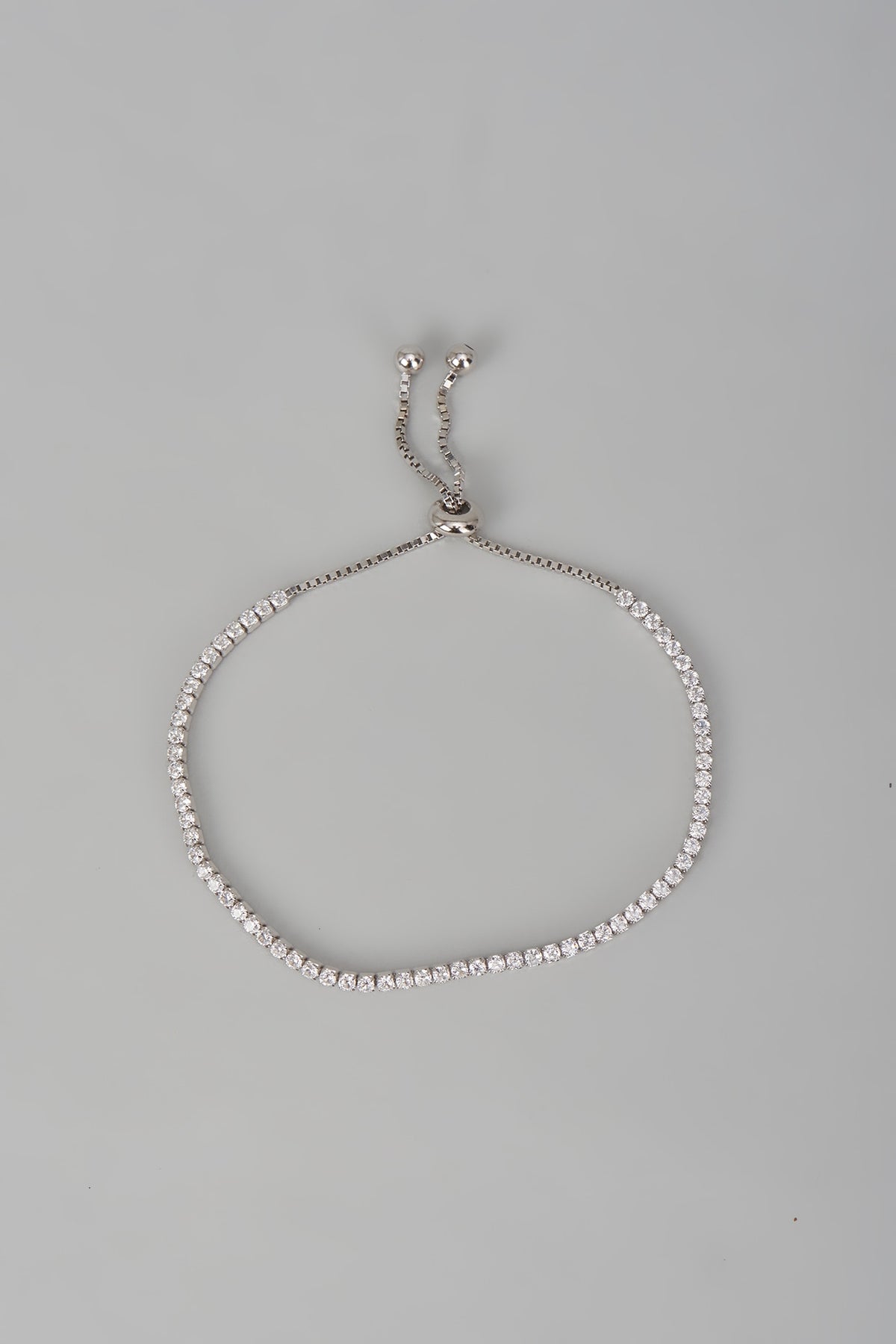 White Finish Zircon Tennis Bracelet In Sterling Silver
