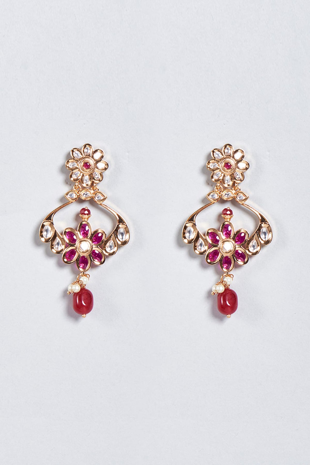 Gold Finish Dangler Earrings With Red Stones