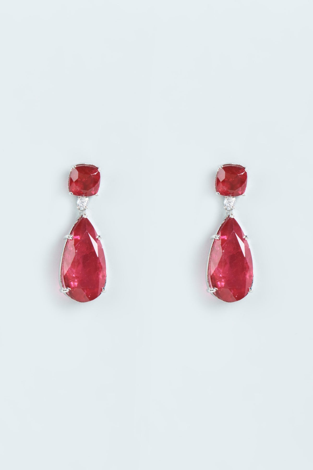 White Finish Red Stone Dangler Earrings