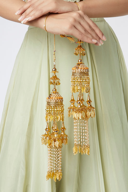 Gold Finish Hanging Kaleeras With Orange Stones