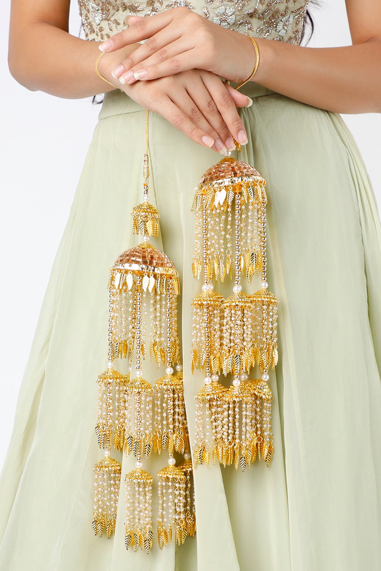 Gold Finish Kaleeras With Pearl Leaf Motifs