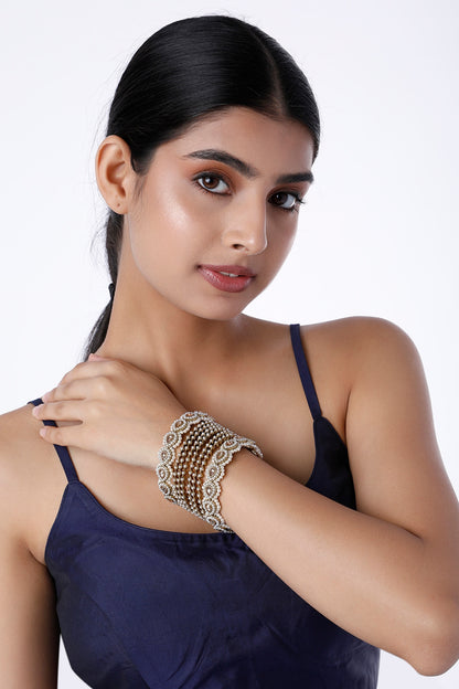 Gold Finish Pearl Bangles (Set Of 8)