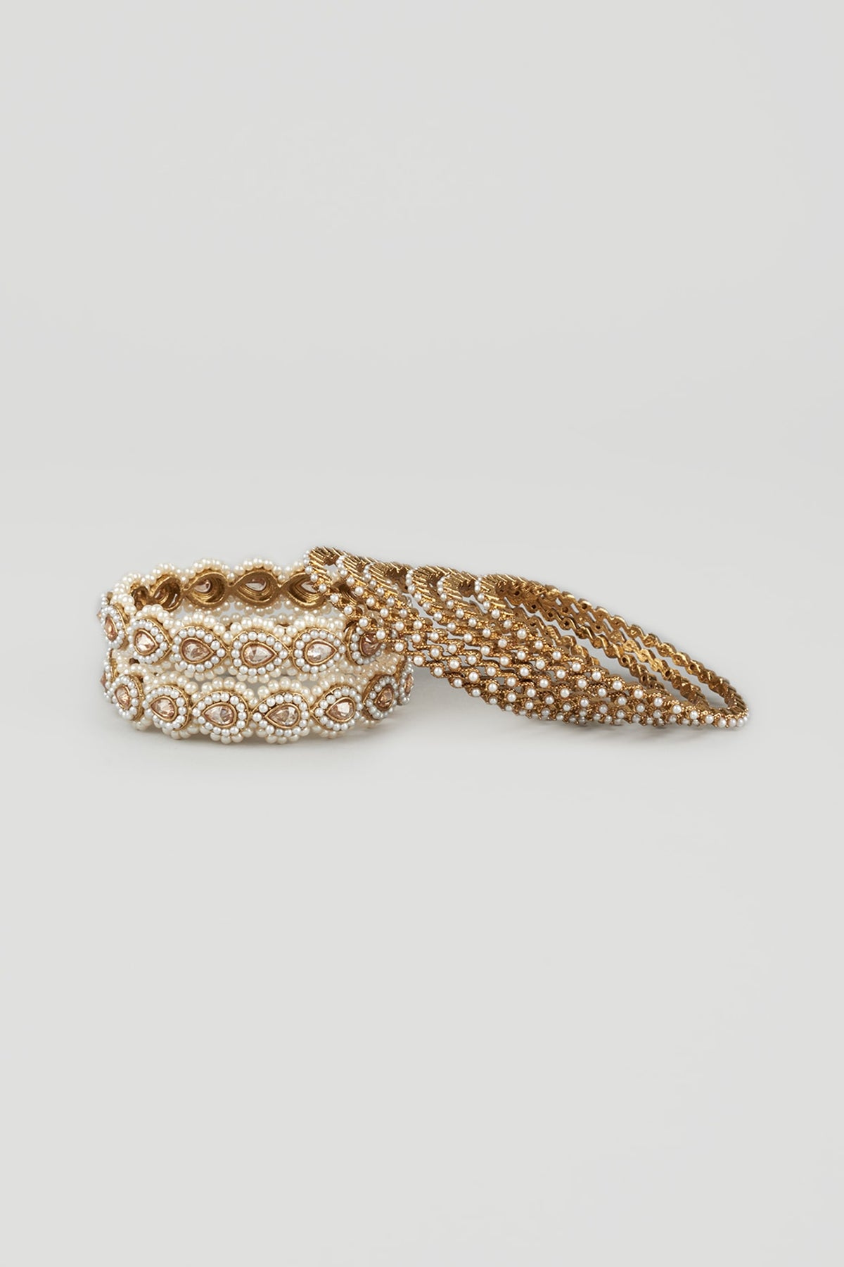 Gold Finish Pearl Bangles (Set Of 8)