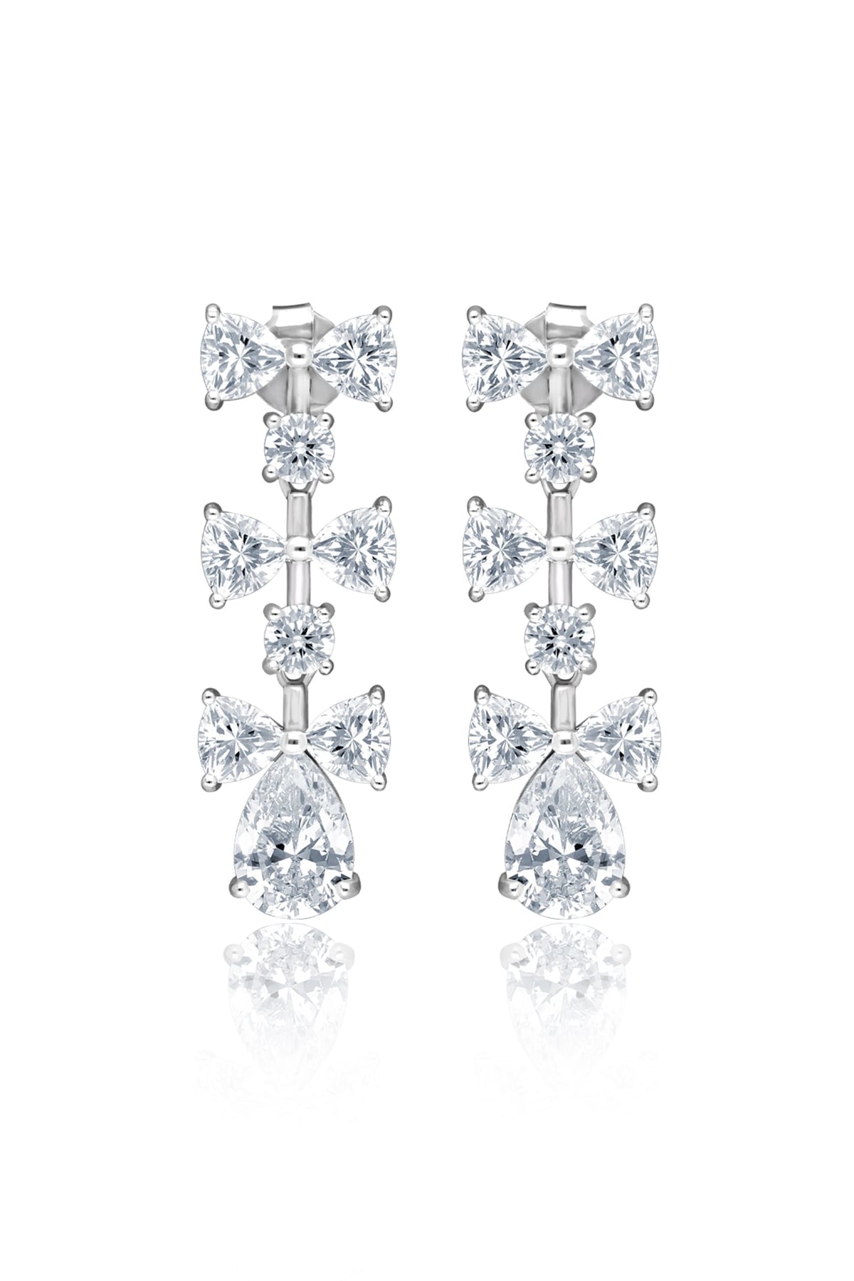 White Rhodium Finish Cubic Zirconia Luminous Bow Dangler Earrings In Sterling Silver