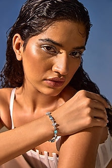 White Rhodium Finish Blue Cubic Zirconia Crystal Tennis Bracelet In Sterling Silver