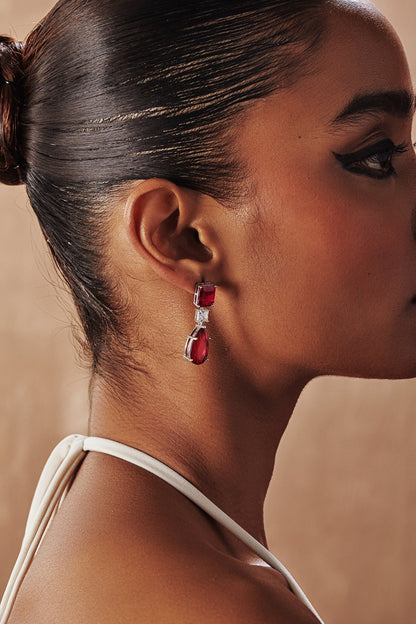 White Rhodium Finish Ruby Teardrop Cubic Zirconia Crystal Dangler Earrings In Sterling Silver