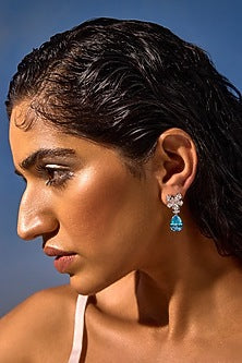 White Rhodium Finish Aqua Cubic Zirconia Crystal Floral Stud Earrings In Sterling Silver