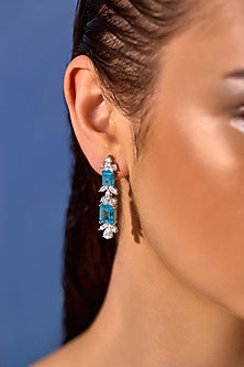 White Rhodium Finish Aqua Cubic Zirconia Crystal Floral Stud Earrings In Sterling Silver