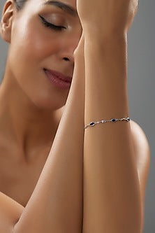 White Finish Blue Sapphire Stone Tennis Bracelet In Sterling Silver