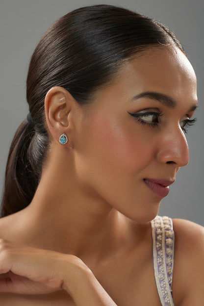 White Finish Halo Diamond & Aquamarine Gemstone Pear-Shaped Stud Earrings In Sterling Silver