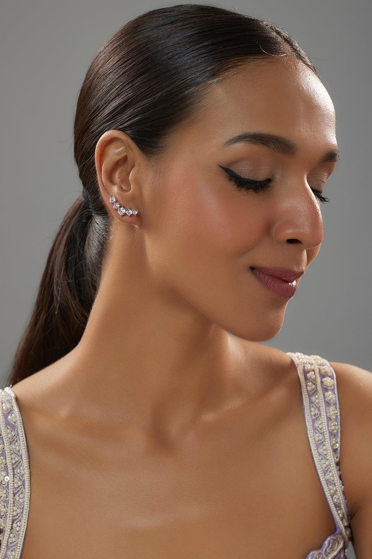White Finish Zircon Stud Earrings In Sterling Silver