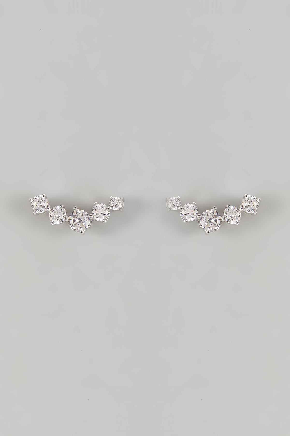 White Finish Zircon Stud Earrings In Sterling Silver