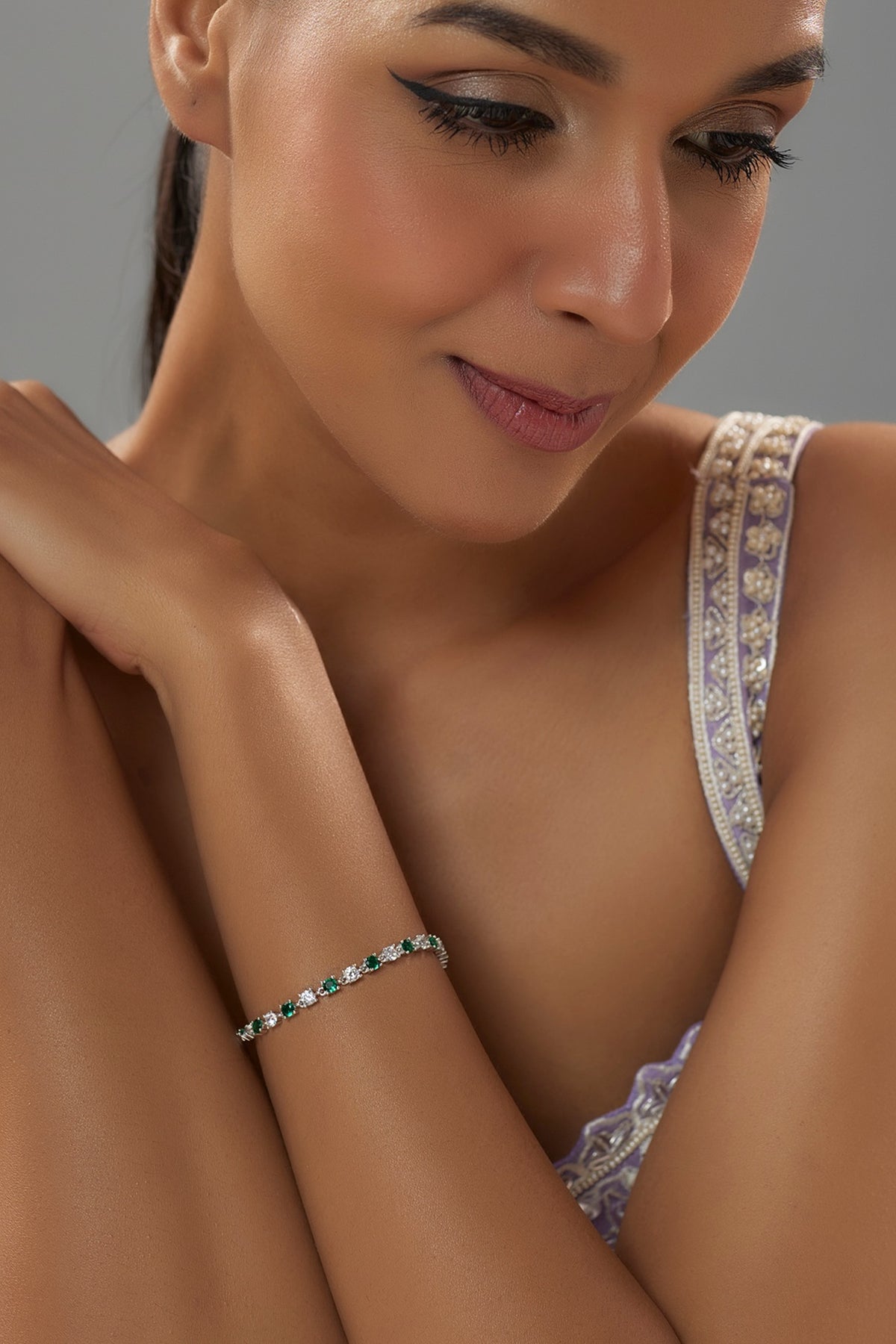White Finish Diamond & Emerald Stone Bracelet In Sterling Silver