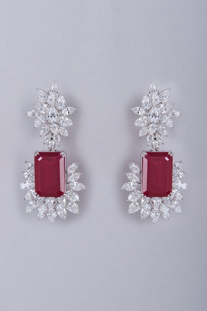 White Finish Semi-Precious Ruby Dangler Earrings In Sterling Silver
