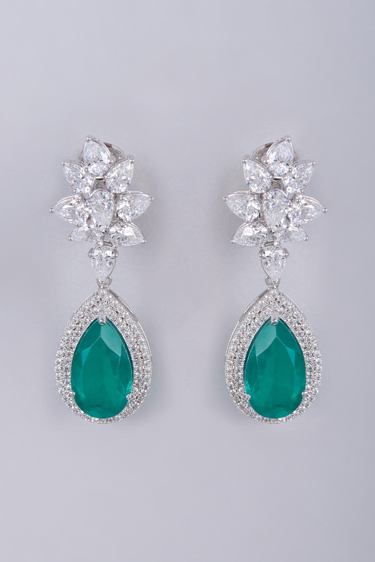 White Finish Semi-Precious Emerald Dangler Earrings In Sterling Silver
