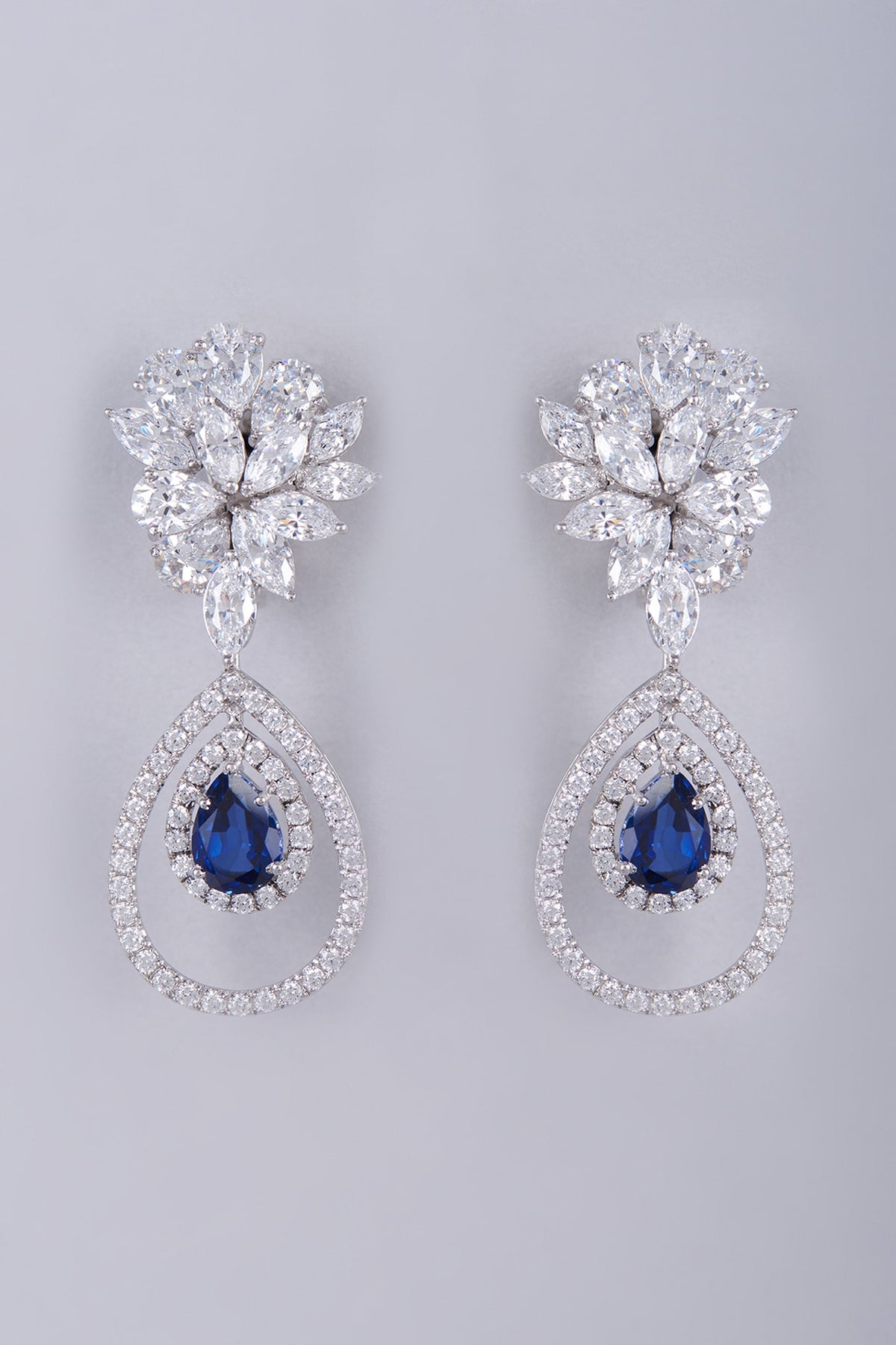 White Finish Semi-Precious Sapphire Dangler Earrings In Sterling Silver
