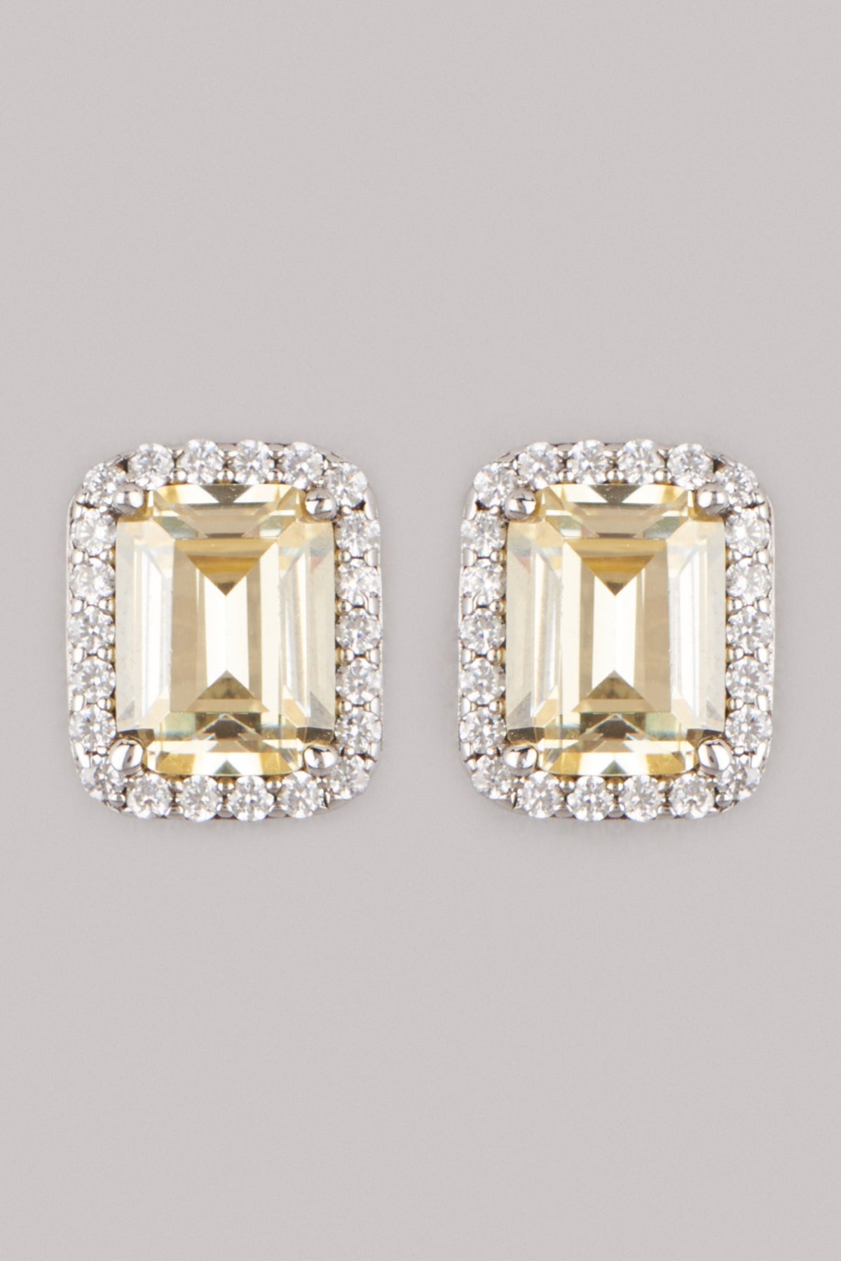 White Finish Yellow Sapphire Stud Earrings In Sterling Silver