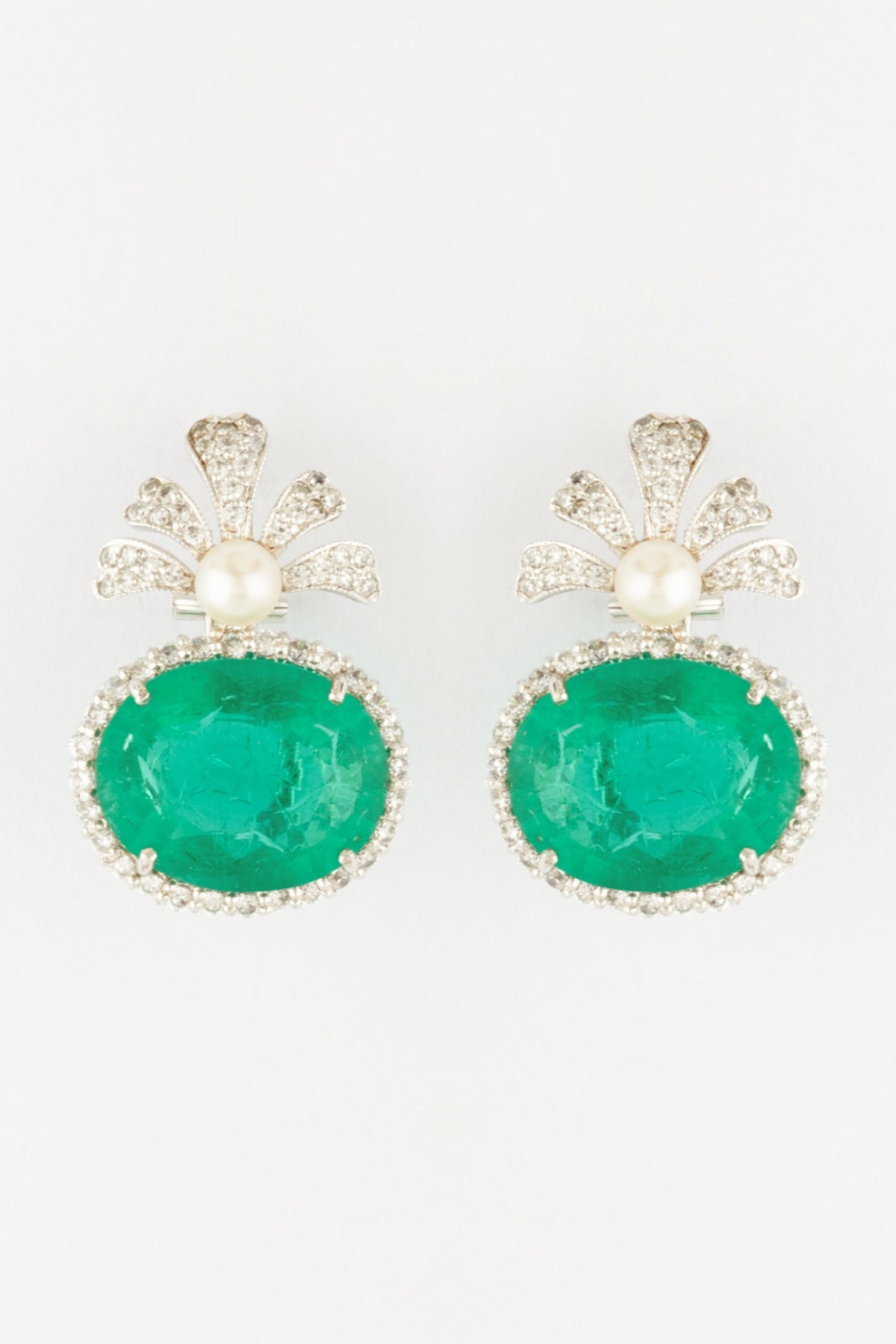 White Finish Semi Precious Emerald Dangler Earrings In Sterling Silver