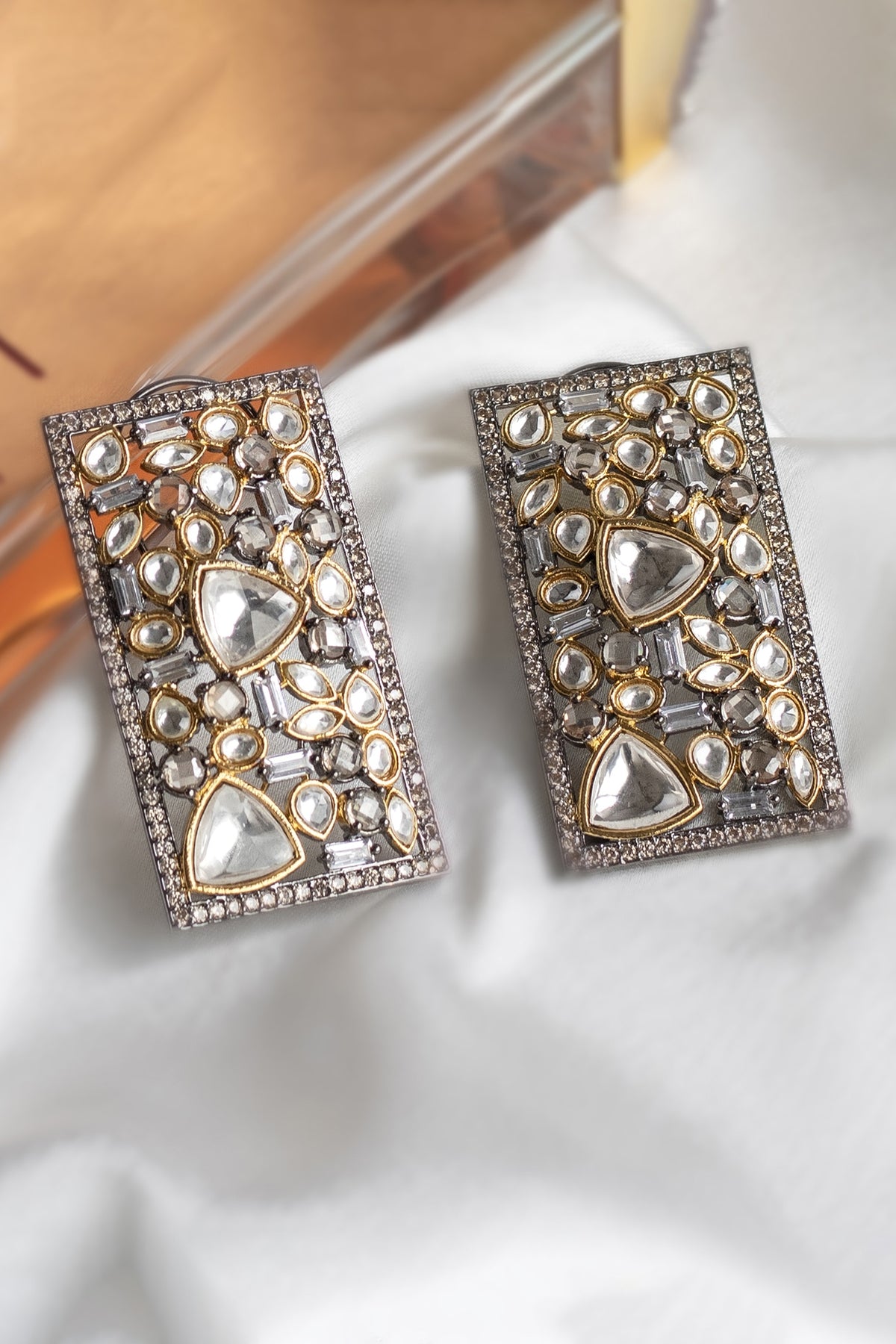 Two Tone Finish Zircons Stud Earrings