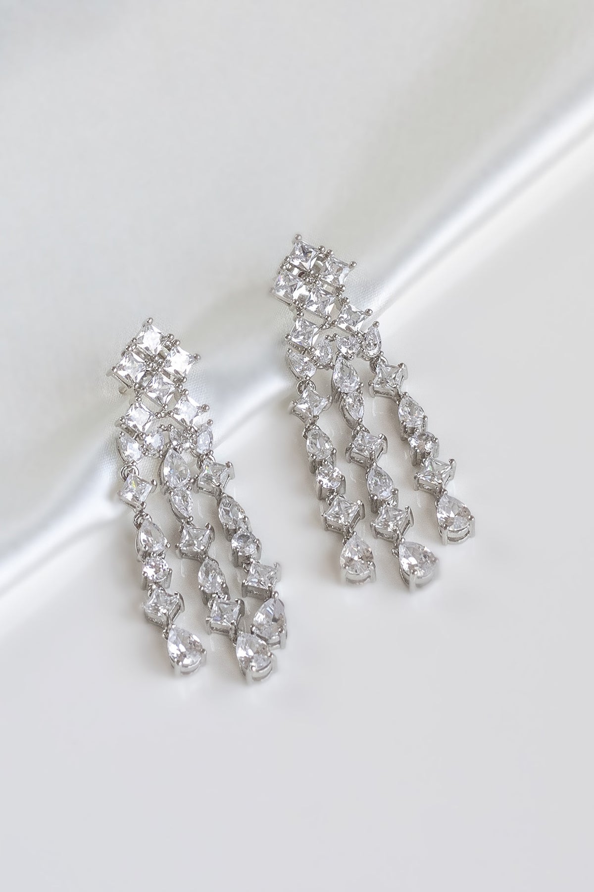 White Finish Faux Diamond Dangler Earrings
