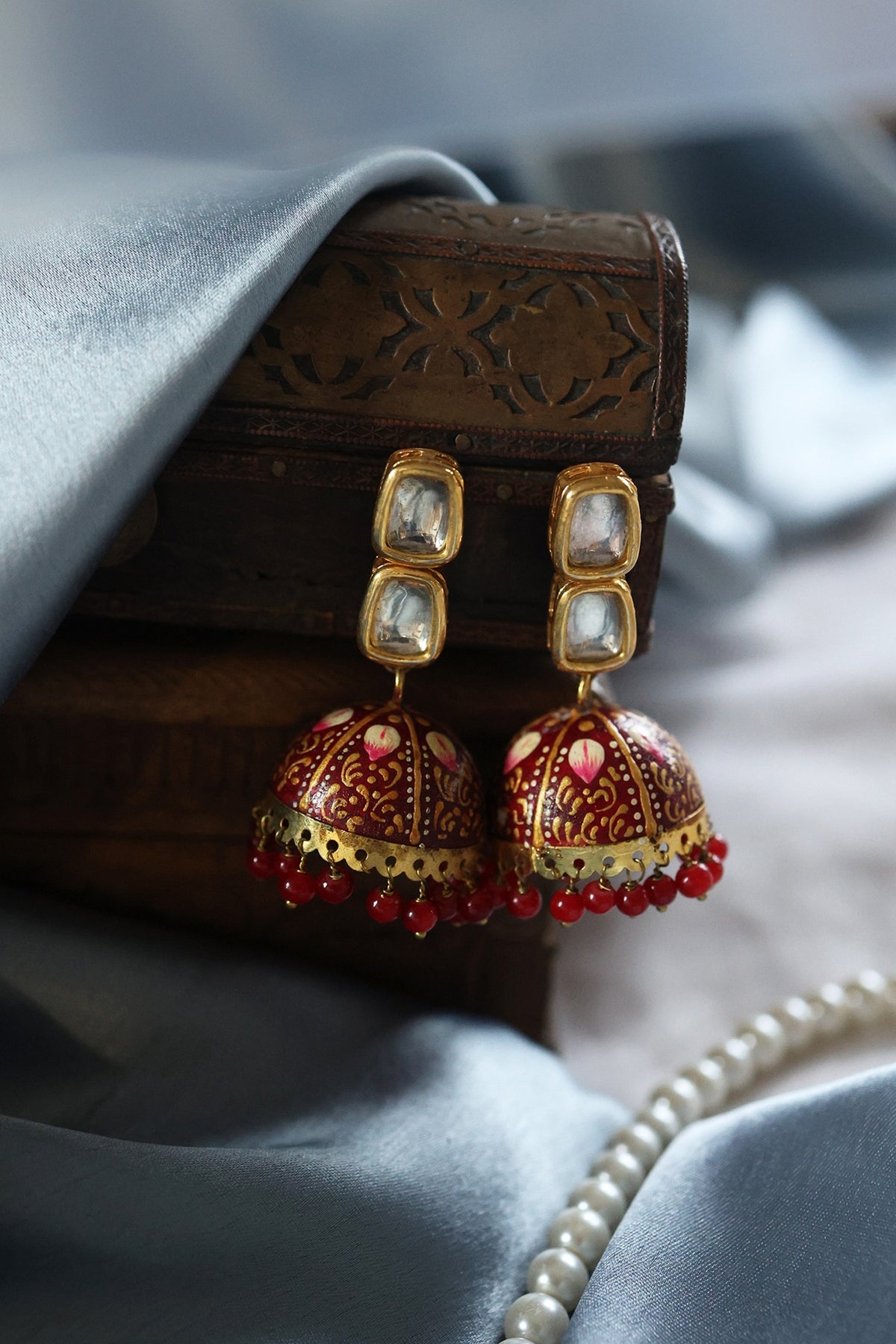 Red Meenakari Jhumka Earrings.
