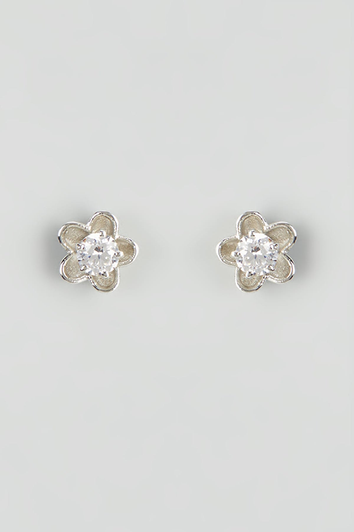 White Rhodium Finish Zircon Stud Earrings In Sterling Silver