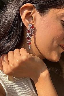 White Finish Red Stone Dangler Earrings In Sterling Silver