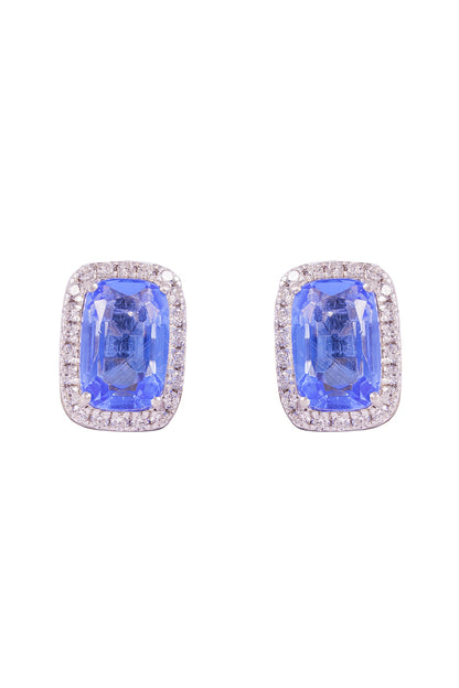 White Finish Blue Stone Stud Earrings In Sterling Silver