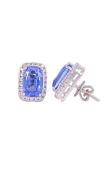 White Finish Blue Stone Stud Earrings In Sterling Silver
