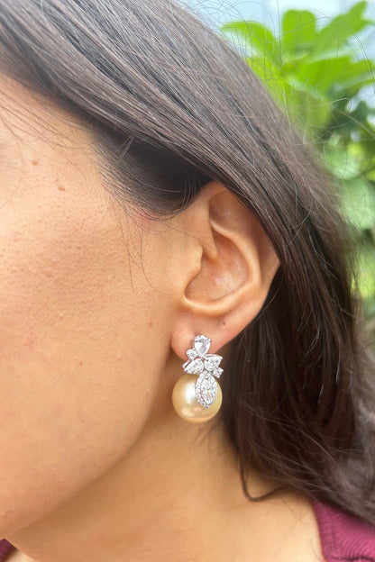 White Finish Fancy-Cut Cubic Zirconia & Round Pearl Floral Stud Earrings In Sterling Silver