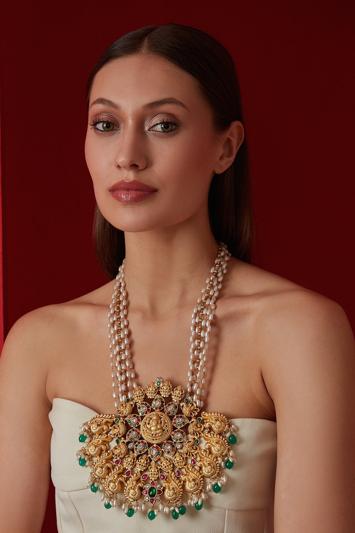 Gold Finish Navratna Stone & Pearl Ganesh Motif Necklace
