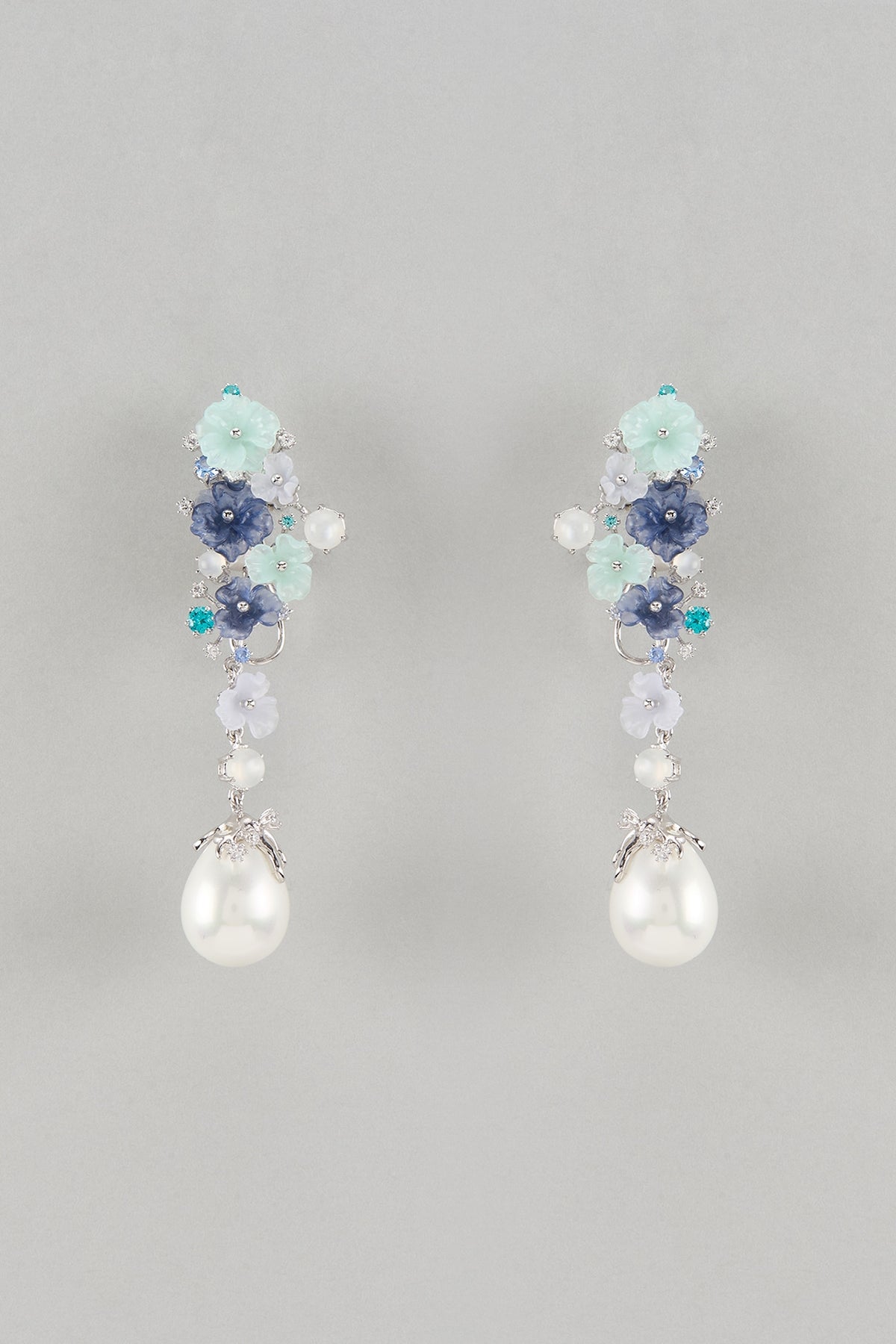White Finish Cubic Zirconia & Blue Stone Floral Dangler Earrings In Sterling Silver