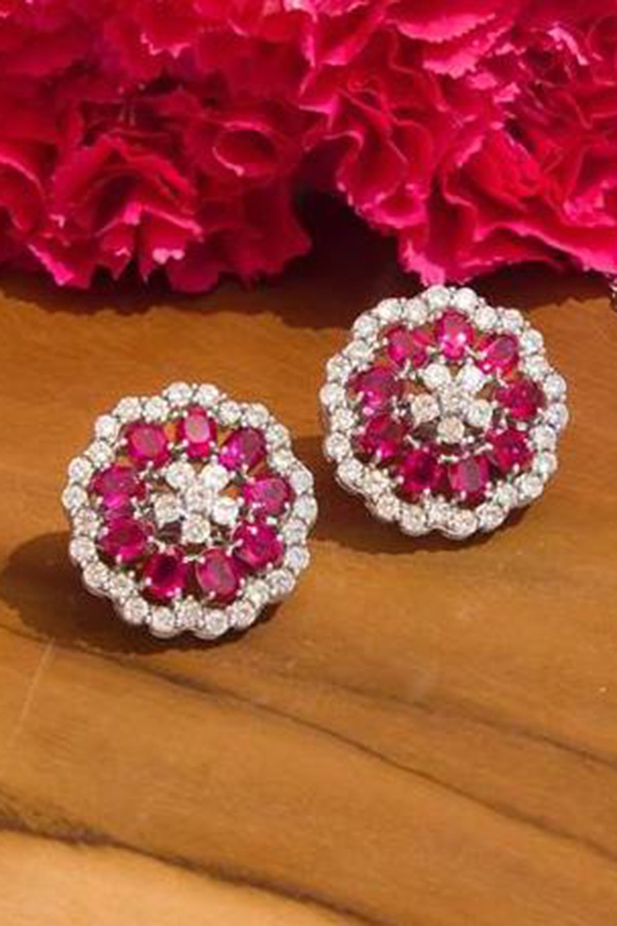 White Finish Pink Stones Stud Earrings In Sterling Silver