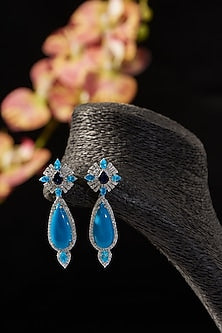 White Finish Turquoise Stone Dangler Earrings In Sterling Silver