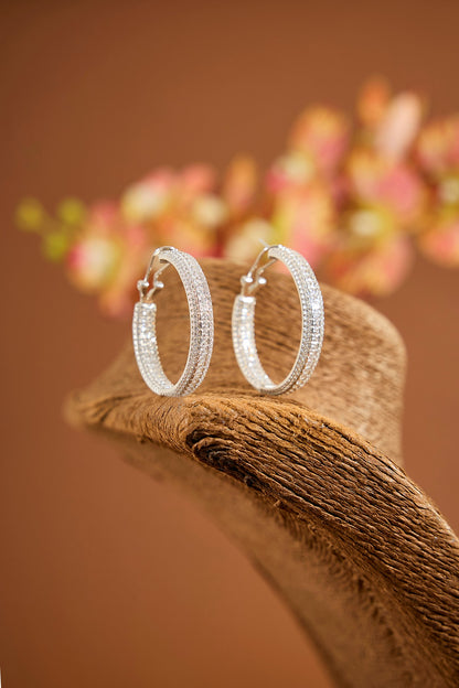 White Gold Finish Eurostar Zircon Hoop Earrings In Sterling Silver