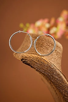 White Gold Finish Eurostar Zircon Hoop Earrings In Sterling Silver