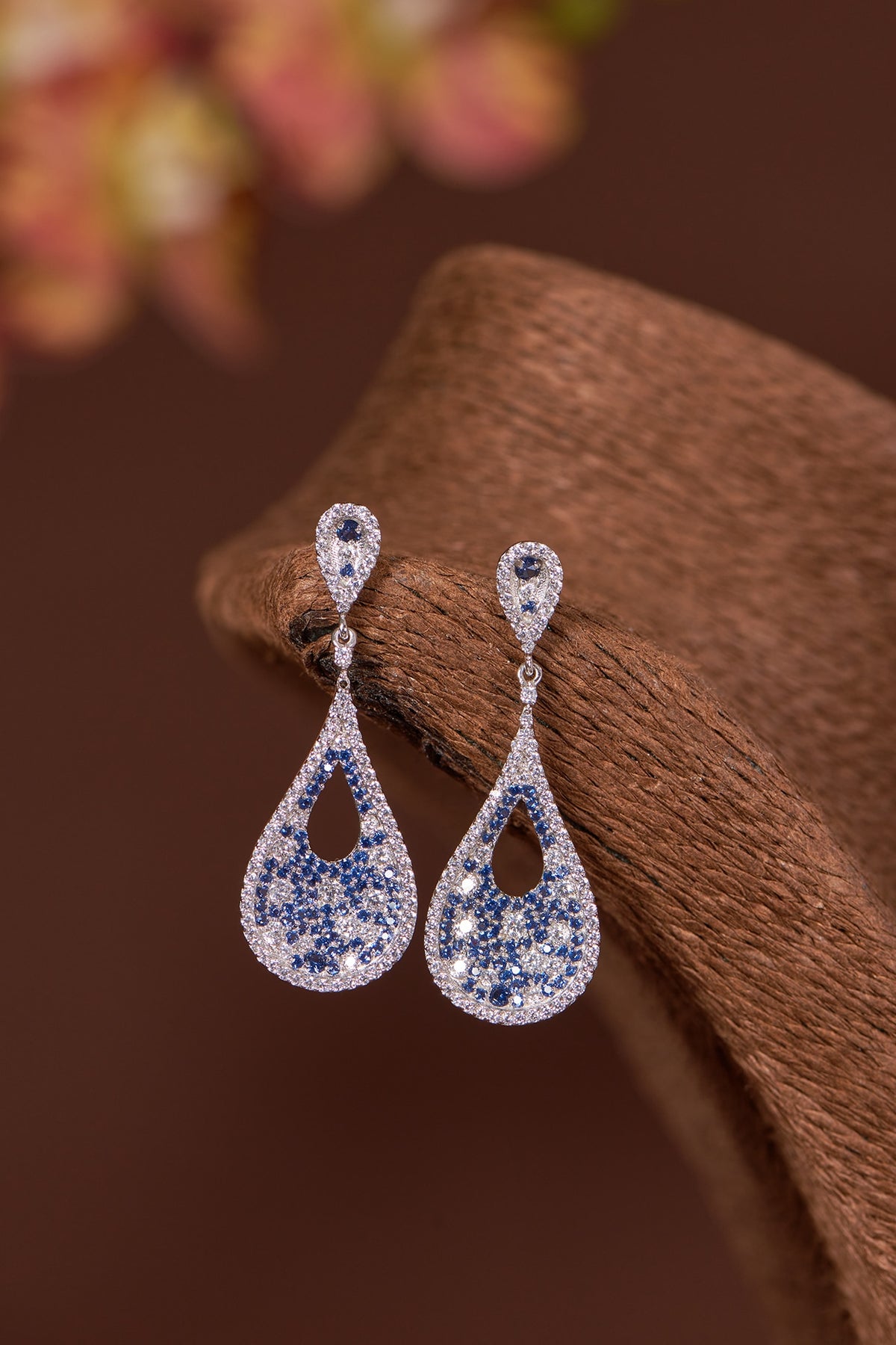 White Finish Zircon & Blue Sapphire Dangler Earrings In Sterling Silver