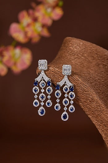 White Finish Zircon & Synthetic Blue Sapphire Dangler Earrings In Sterling Silver