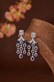 White Finish Zircon & Synthetic Blue Sapphire Dangler Earrings In Sterling Silver