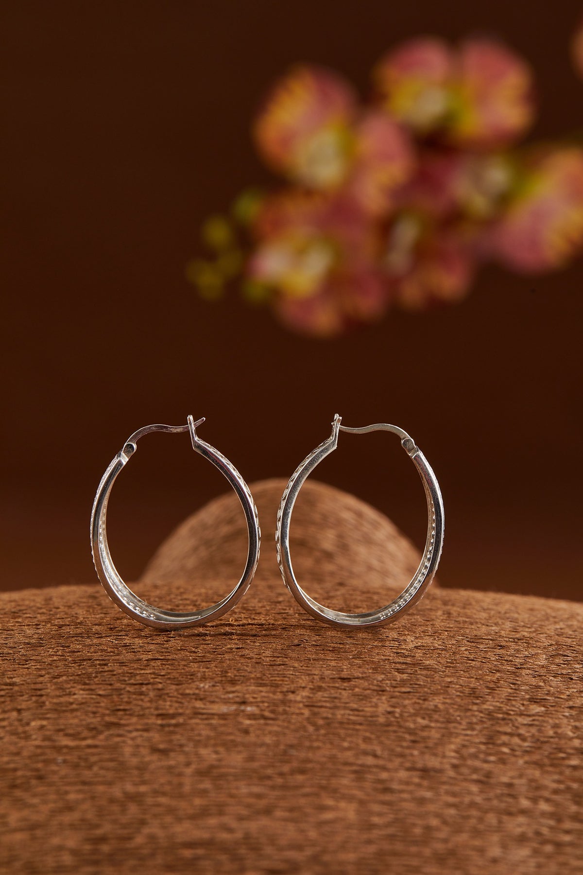 White Gold Finish Zircon Hoop Earrings In Sterling Silver