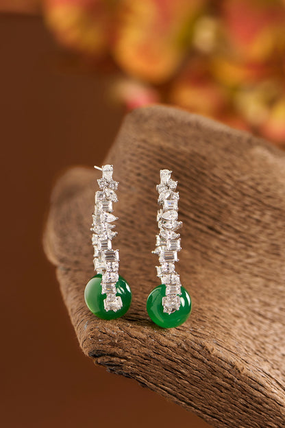 White Gold Finish Eurostar Zircons & Glass-Filled Emerald Stone Hoop Earrings In Sterling Silver
