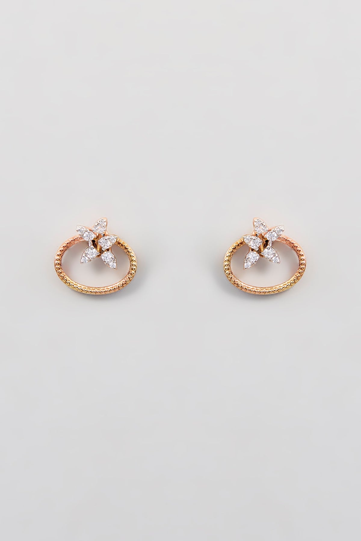 Gold Finish Zircon Stud Earrings In Sterling Silver