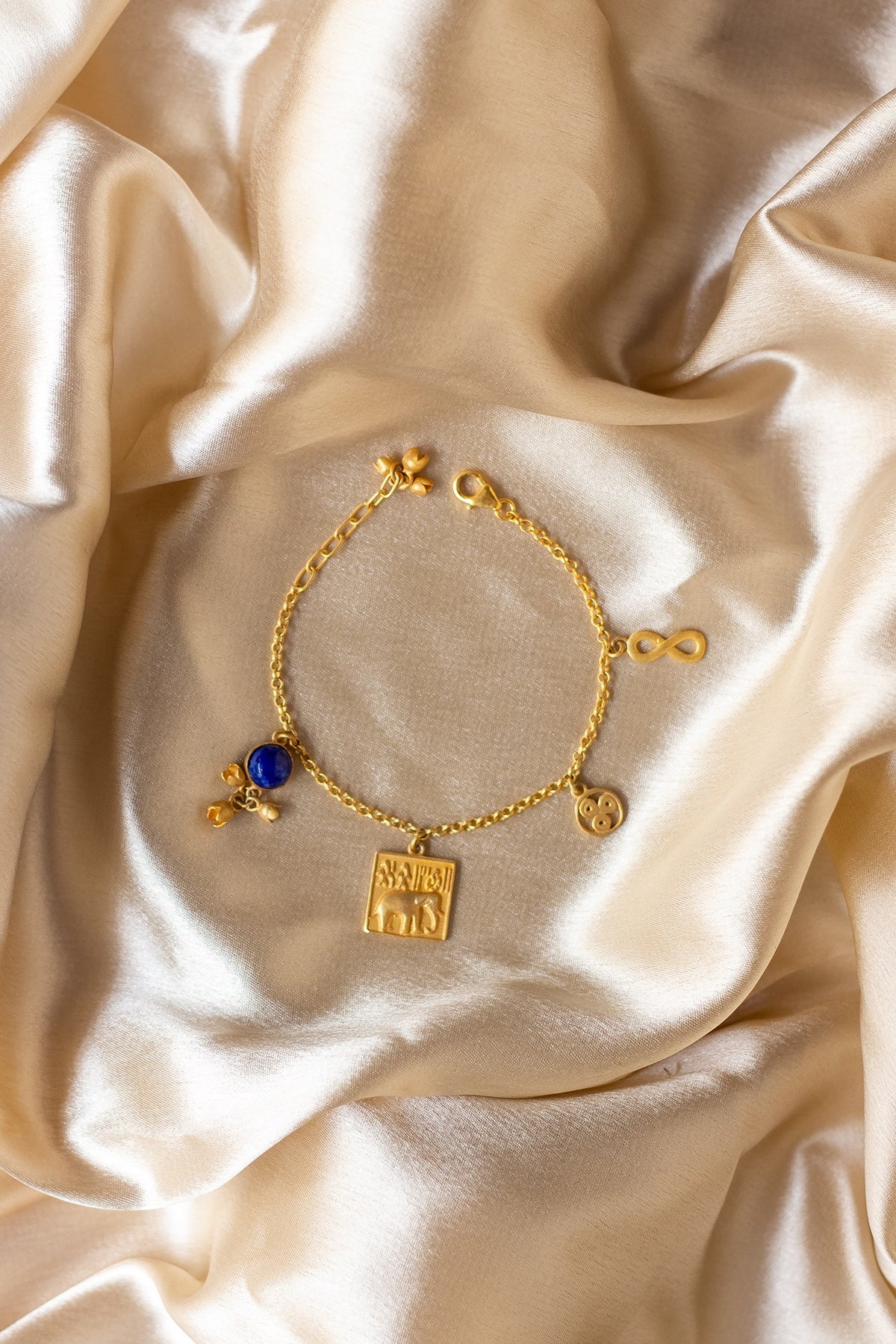 Gold Finish Indus Valley Charm Bracelet In Sterling Silver