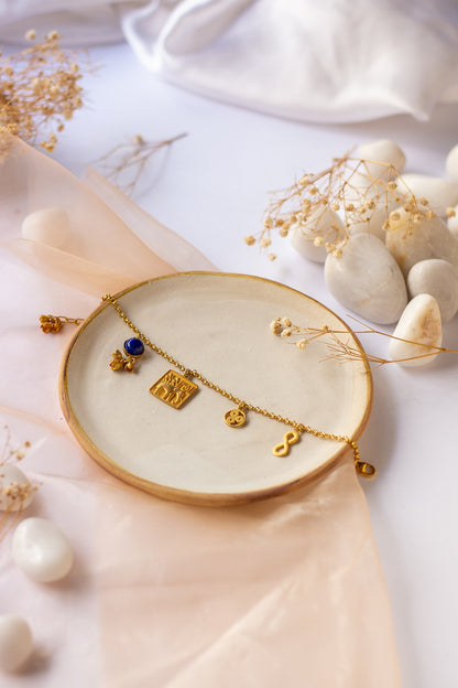 Gold Finish Indus Valley Charm Bracelet In Sterling Silver