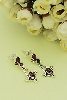 White Finish Garnet Teardrop Dangler Earrings In Sterling Silver