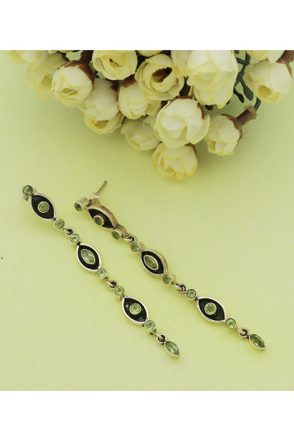 White Finish Peridot Eye Dangler Earrings In Sterling Silver
