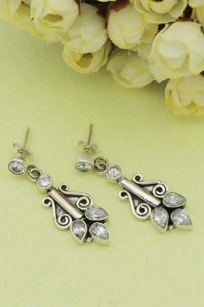White Finish Cubic Zirconia Leaf Dangler Earrings In Sterling Silver
