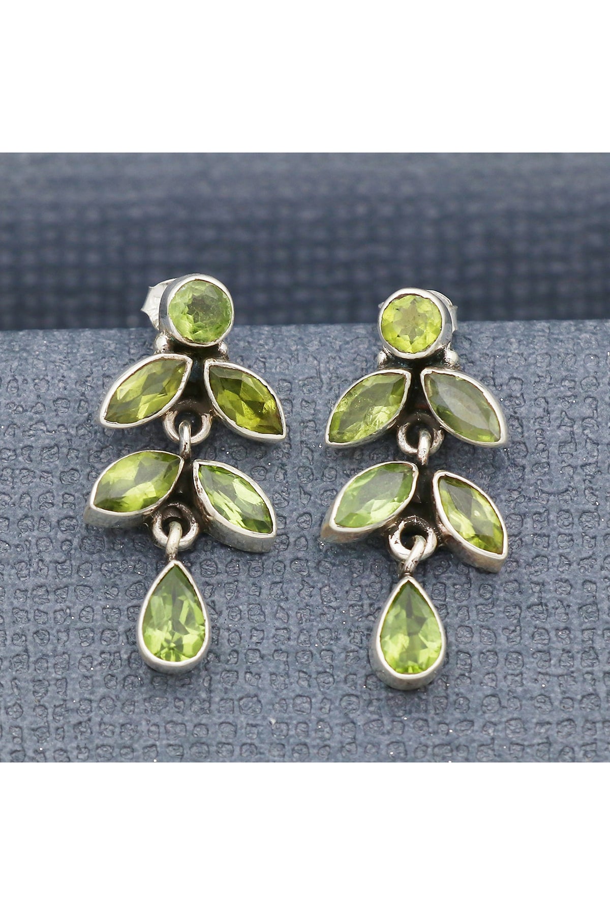 White Finish Peridot Spring Dangler Earrings In Sterling Silver
