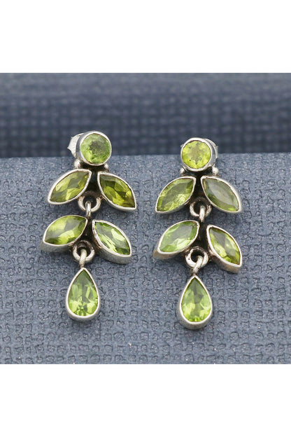 White Finish Peridot Spring Dangler Earrings In Sterling Silver