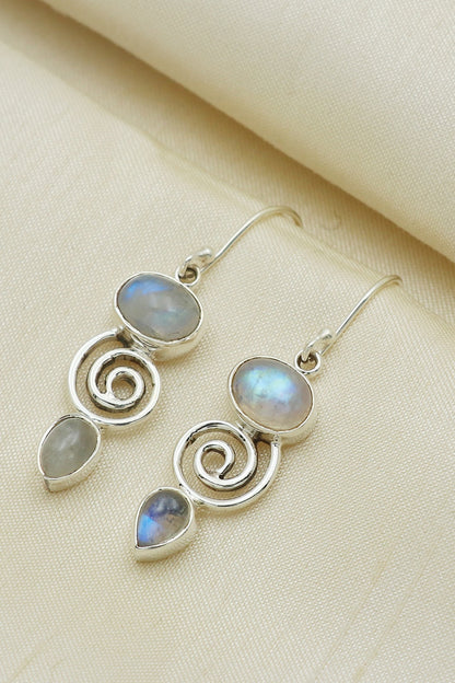 White Finish Blue Moon Stone Dangler Earrings In Sterling Silver